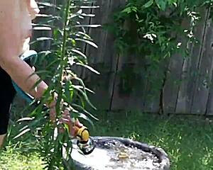 Steffi Waters Tends Her Lush Garden In Steamy Hotwife Redhead Outdoor Display