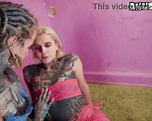 Ever seen alt inked girls tease with strap-ons before they dive into full girl-on-girl action