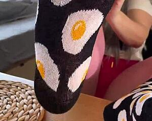 She teases with fragrant nylon feet on desk inviting you to savor every toe