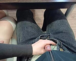 Jerked off classmate's cock under desk during lecture in miniskirt heels socks