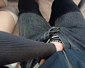 Jerked off classmate's cock under desk during lecture in miniskirt heels socks