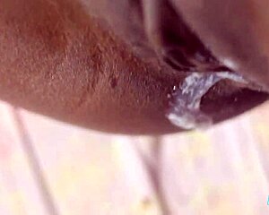 Homemade close-up creampie fills petite 18-year-old ebony teen's shaved wet pussy with huge black cock orgasm.
