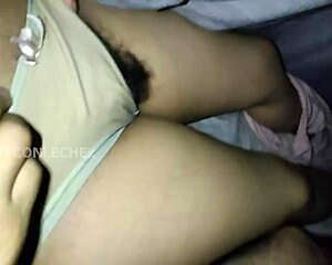 She sleeps as I slide into her hairy pussy without waking till I cum all over her ass