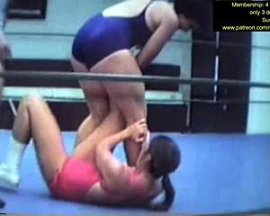 mixed wrestling match unfolds with intense grapples and holds