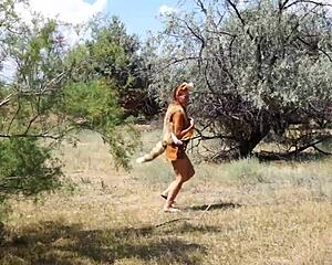 Shy Aboriginal Mature Cosplays and Dances Outdoors in Costume
