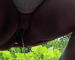 Devout married milf sneaks public pee on busy outdoor street teasing eyes