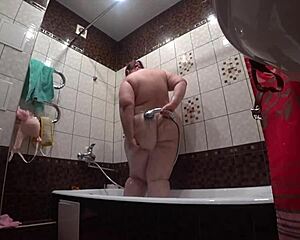 Hidden camera spies on fat model with big ass in bathroom