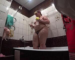 Hidden camera spies on fat model with big ass in bathroom