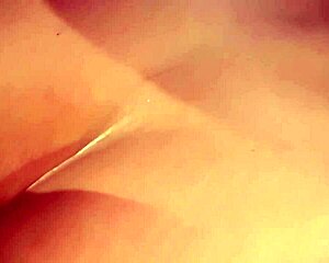 Brunette with a navel piercing experiences deep pussy penetration