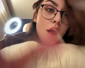 Hot brunette with glasses and big ass gets a luscious facial