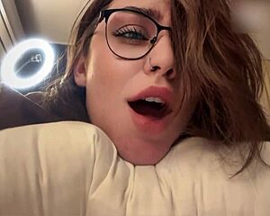 Hot brunette with glasses and big ass gets a luscious facial