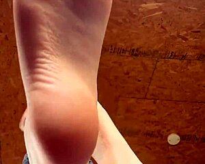 girl puts lotion on feet