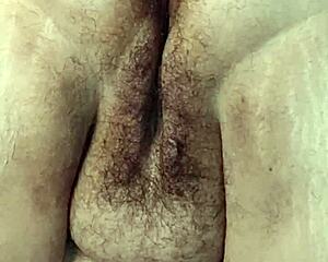 a bbw milf with fat hairy beaver gets fisted in close up view