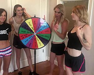 Four girls stripping with wedgie wheel