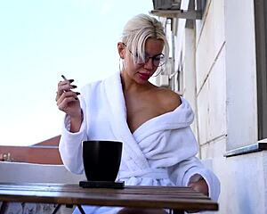 Blonde woman enjoys early morning with tattooed friend