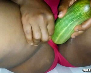 college girl masturbates with big cucumber deep in her pussy