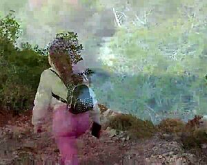 Woman drives car through hills