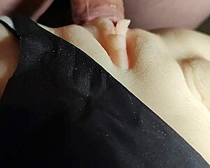 pull aside panties and begin intimate play with the doll
