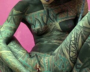 skinny tattooed girl gets horny painting solo with anal gapes squirt