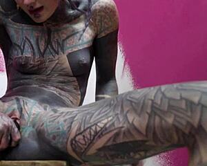 skinny tattooed girl gets horny painting solo with anal gapes squirt